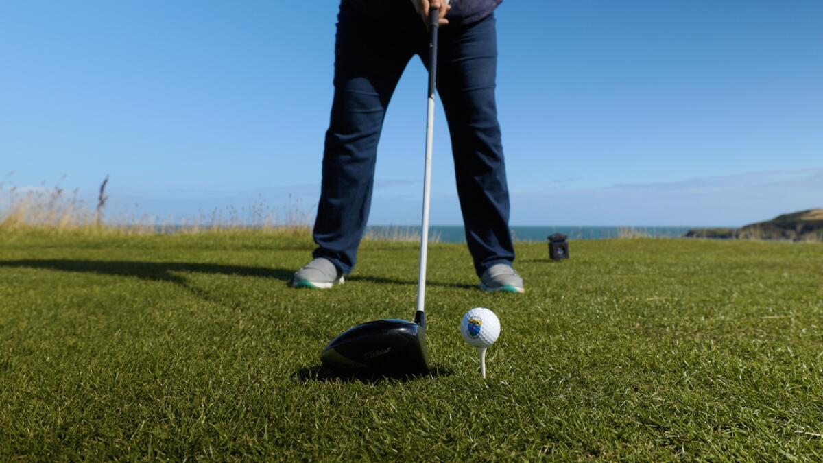 Man golfing in wicklow
